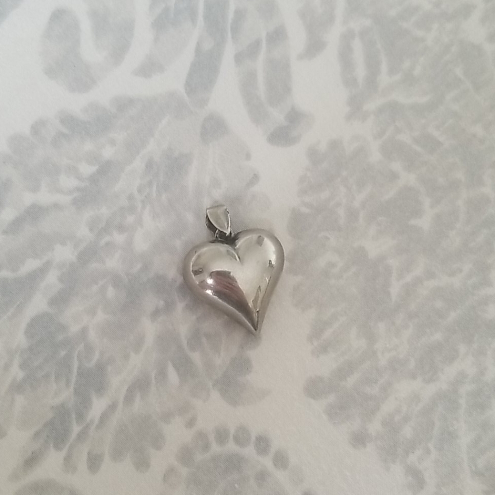 Chunky silver colored heart pendant